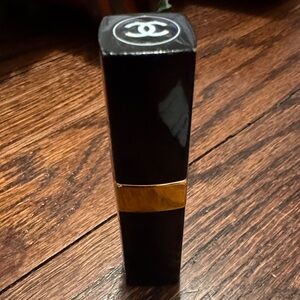 CHANEL Luxurious Black and Gold Lipstick